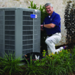 Technician working on Air conditioner