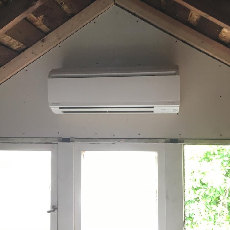 ductless heat pump in breeze way