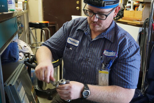 Technician working on part 3