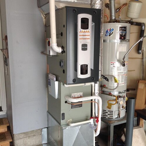 Furnace by water heater