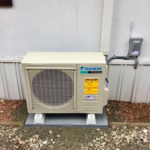 ductless heat pump outside white house